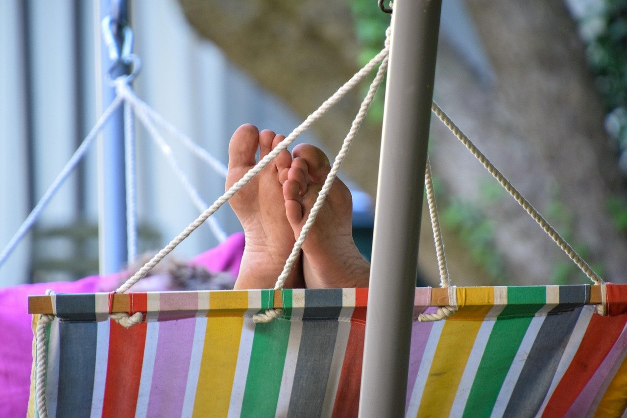 A person enjoying a freshly clean hammock.